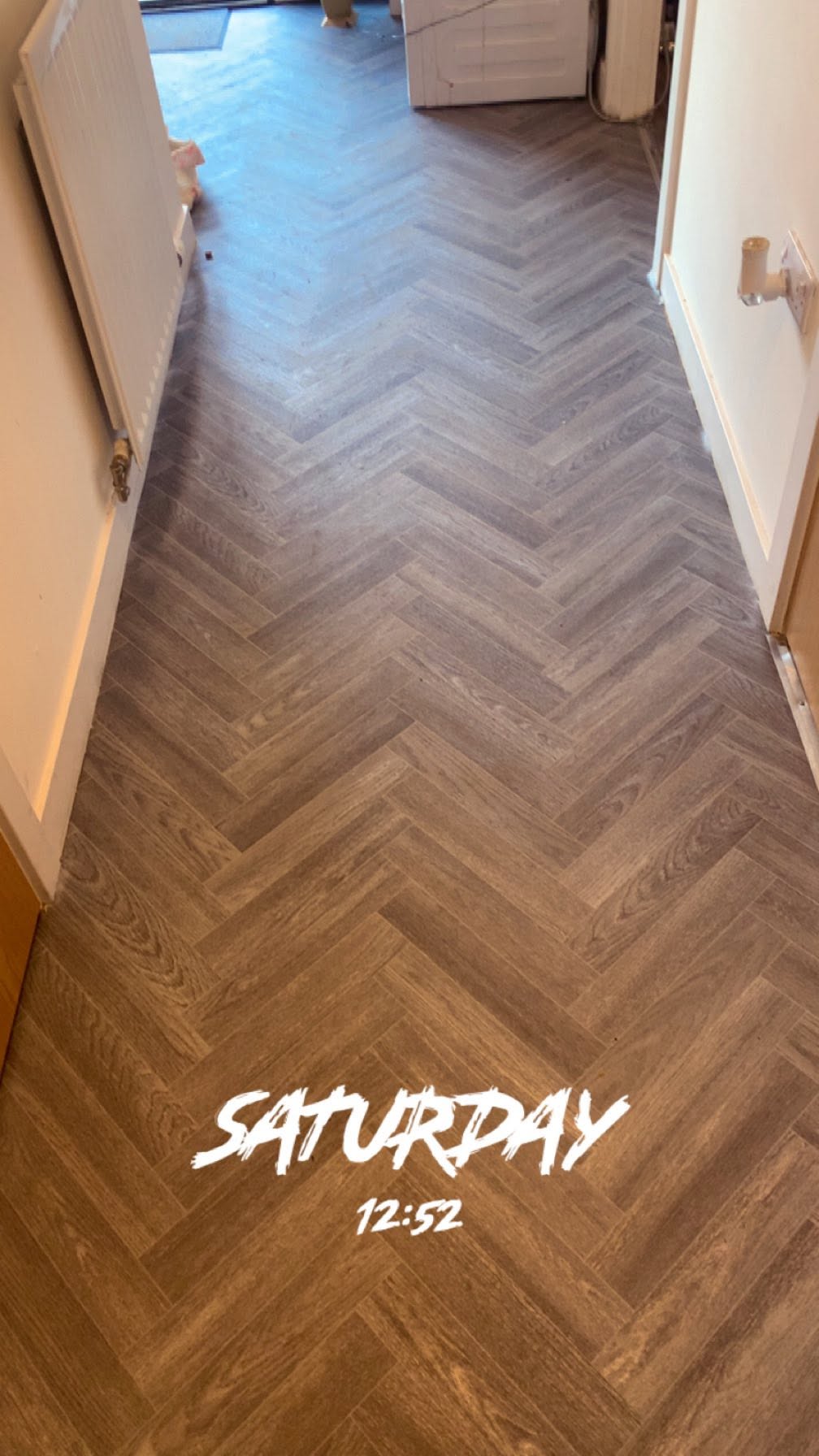 Dark herringbone flooring