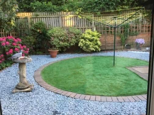 Landscaped Dumfries garden with circular lawn and gravel border